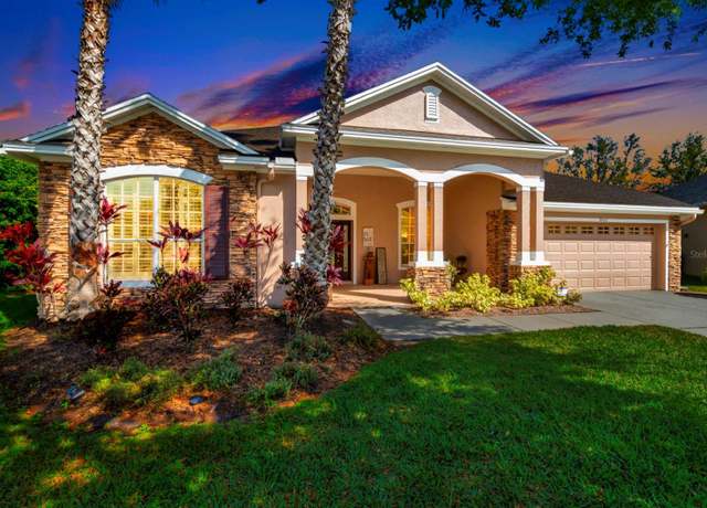 Property at 7051 Derwent Glen Cir, Land O Lakes, FL 34637, 4 beds, 3 baths