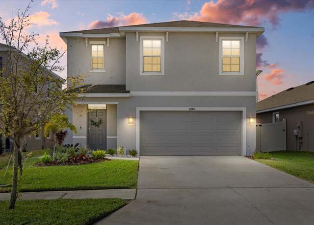Property at 31386 Penny Surf Loop, Wesley Chapel, FL 33545, 5 beds, 3 baths