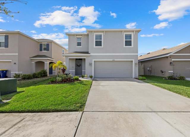 Property at 31386 Penny Surf Loop, Wesley Chapel, FL 33545, 5 beds, 3 baths