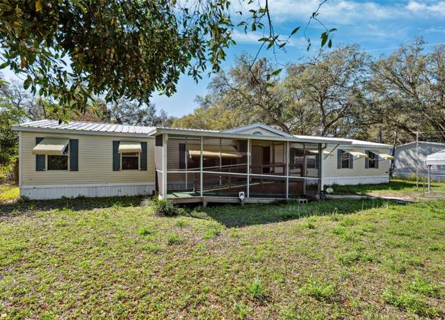 Property at 10031 E Fowler Ave, Thonotosassa, FL 33592, 4 beds, 2 baths