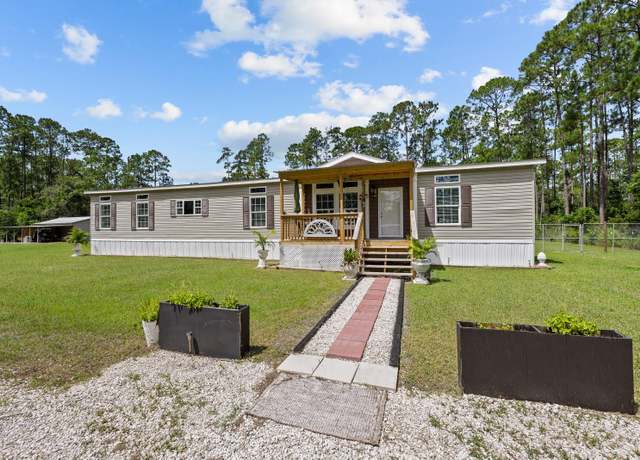 Property at 1820 Satinwood St, Bunnell, FL 32110, 4 beds, 2 baths
