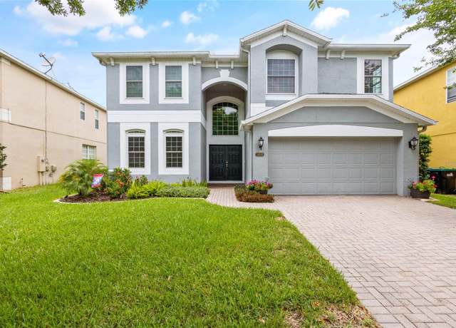 Property at 12666 Moss Park Ridge Dr, Orlando, FL 32832, 5 beds, 4 baths