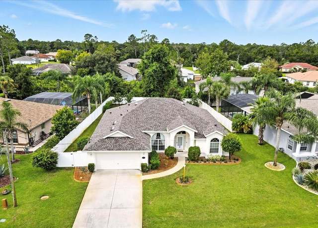 Property at 142 Whispering Pine Dr, Palm Coast, FL 32164, 3 beds, 2 baths