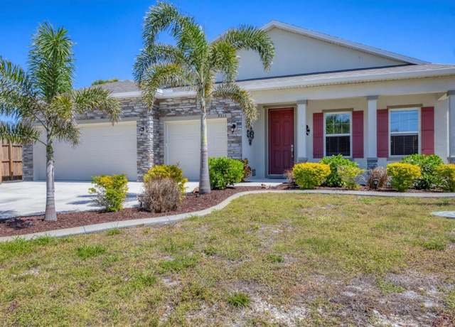 Property at 9213 Spring Cir, Port Charlotte, FL 33981, 4 beds, 3 baths
