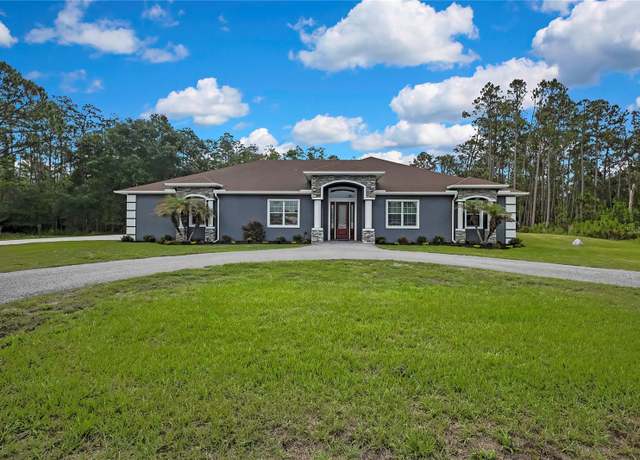 Property at 27338 Elkwood Cir, Wesley Chapel, FL 33544, 4 beds, 3.5 baths