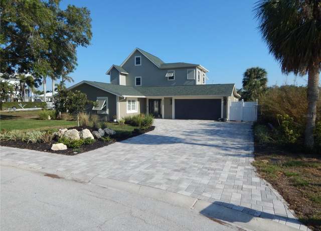 Property at 8025 Island Dr, Port Richey, FL 34668, 4 beds, 2.5 baths