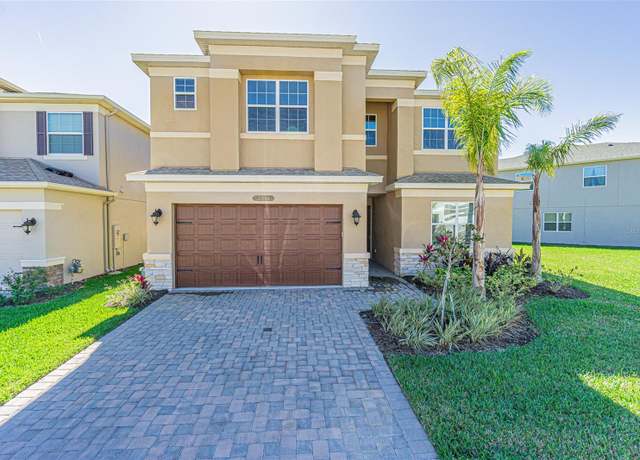 Property at 32684 Tamarind Grove Ln, Wesley Chapel, FL 33543, 5 beds, 4.5 baths