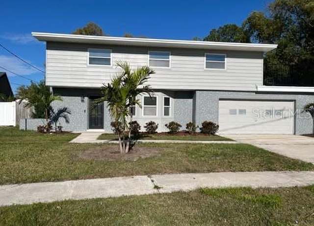 Property at 8320 Boxwood Dr, Tampa, FL 33615, 4 beds, 2.5 baths