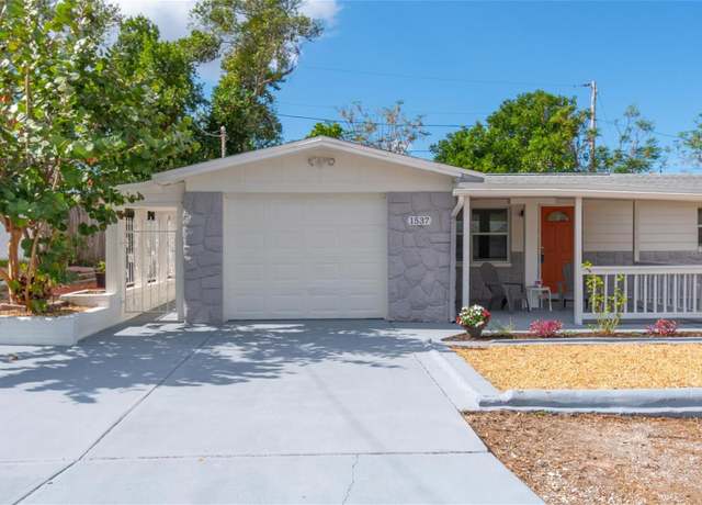 Property at 1537 Excalibur St, Holiday, FL 34690, 4 beds, 3 baths