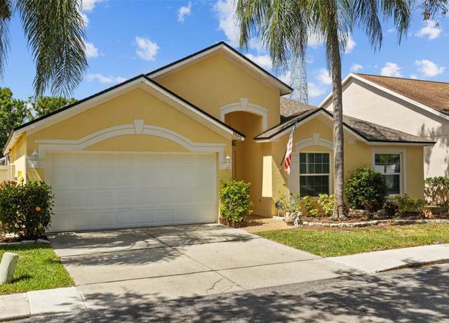Property at 8820 Cypress Hammock Dr, Tampa, FL 33614, 4 beds, 2 baths