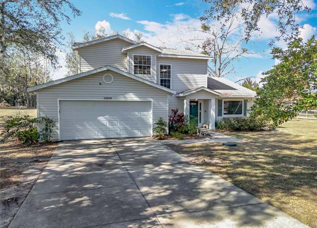 Property at 32531 Wolfs Trl, Sorrento, FL 32776, 4 beds, 2.5 baths