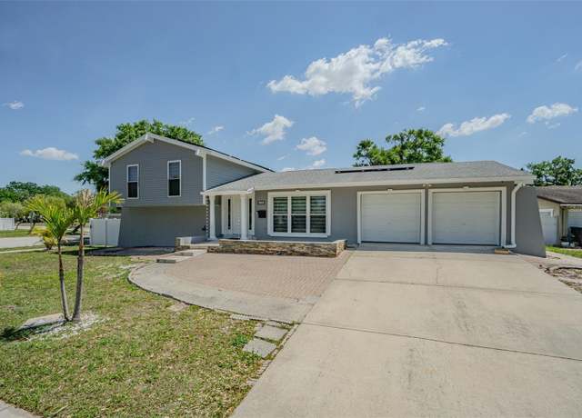 Property at 7015 Cobblewood Ct, Tampa, FL 33615, 4 beds, 3 baths