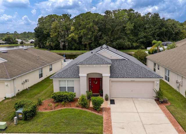 Property at 25323 Lexington Oaks Blvd, Wesley Chapel, FL 33544, 4 beds, 2 baths