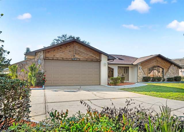 Property at 1011 Altoona Ave, Spring Hill, FL 34609, 4 beds, 2 baths