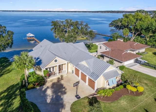 Property at 12943 SE Sunset Harbor Rd, Weirsdale, FL 32195, 7 beds, 4 baths