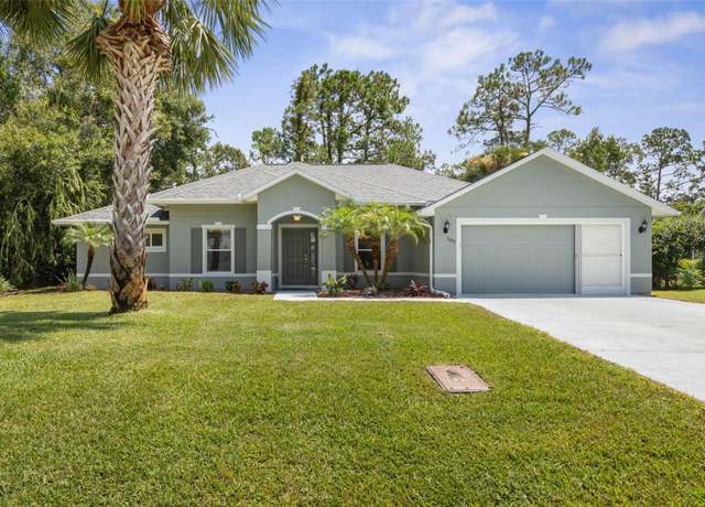 Property at 105 Woodside Dr, Palm Coast, FL 32164, 4 beds, 2 baths