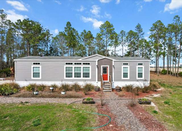 Property at 12991 SE 21st Pl, Morriston, FL 32668, 3 beds, 2 baths
