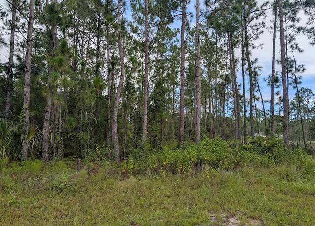 Property at 1122 Poinciana Dr, Indian Lake Estates, FL 33855
