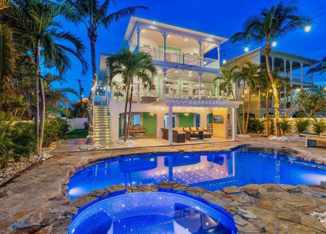 Property at 644 Boca Ciega Isle Dr, St Pete Beach, FL 33706, 4 beds, 5.5 baths