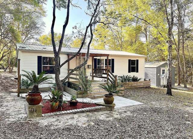 Property at 11090 NE 110th Ave, Archer, FL 32618, 3 beds, 2 baths