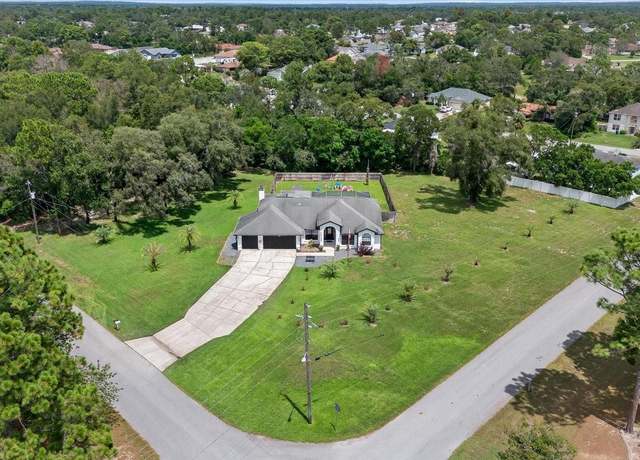 Property at 2002 Maximilian Ave, Spring Hill, FL 34609, 4 beds, 2 baths