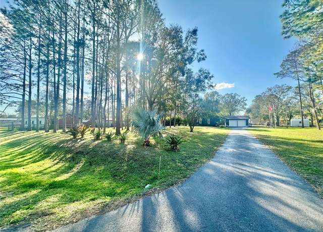 Property at 18840 Rustic Woods Trl, Odessa, FL 33556, 3 beds, 2 baths