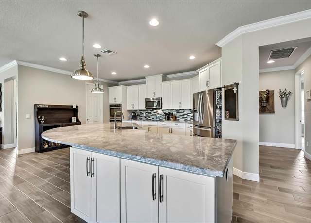 Property at 1846 Moorhen Way, Lutz, FL 33558, 4 beds, 3 baths