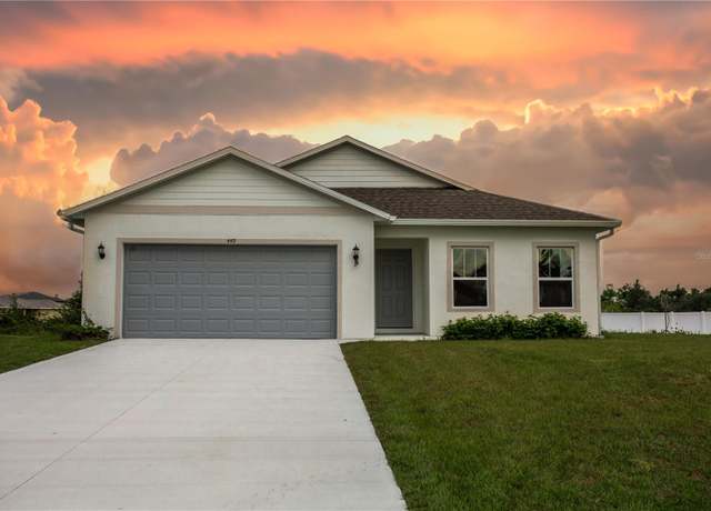 Property at 449 Grant Blvd, Lehigh Acres, FL 33974, 4 beds, 2 baths