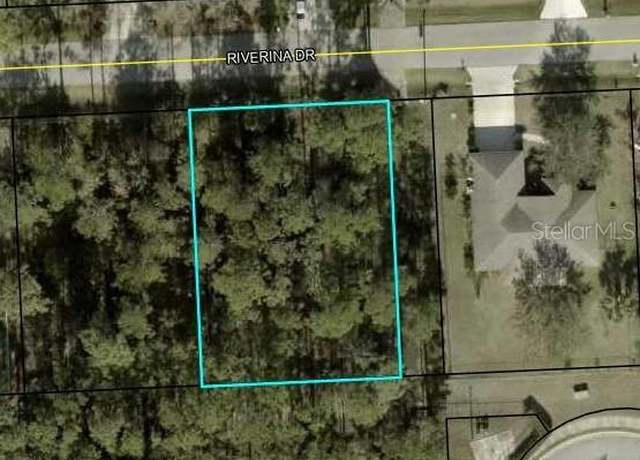 Property at 32 Riverina Dr, Palm Coast, FL 32164