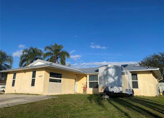 Property at 1697 Cains Ave NW, Palm Bay, FL 32907, 4 beds, 2 baths