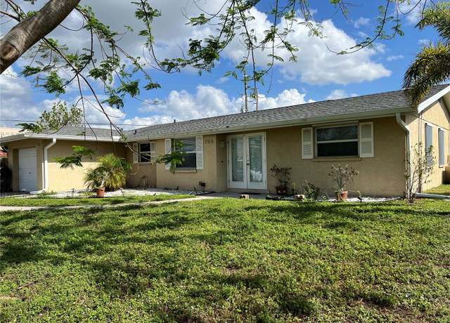Property at 705 Crestview Cir NW, Port Charlotte, FL 33948, 3 beds, 2 baths