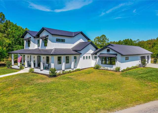 Property at 1015 Tallacoe Trl, New Smyrna Beach, FL 32168, 5 beds, 3.5 baths