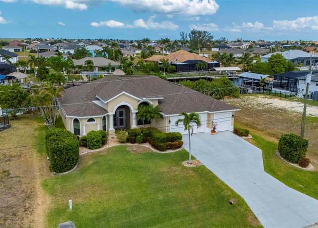 Property at 810 NW 36th Ave, Cape Coral, FL 33993, 4 beds, 2.5 baths