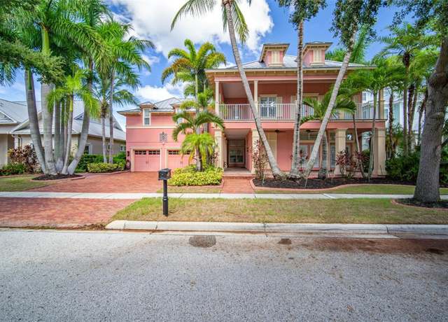 Property at 825 Islebay Dr, Apollo Beach, FL 33572, 6 beds, 4.5 baths