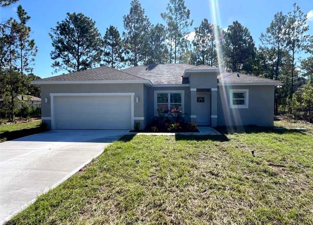 Property at 7809 N Santos Dr, Citrus Springs, FL 34434, 4 beds, 2.5 baths
