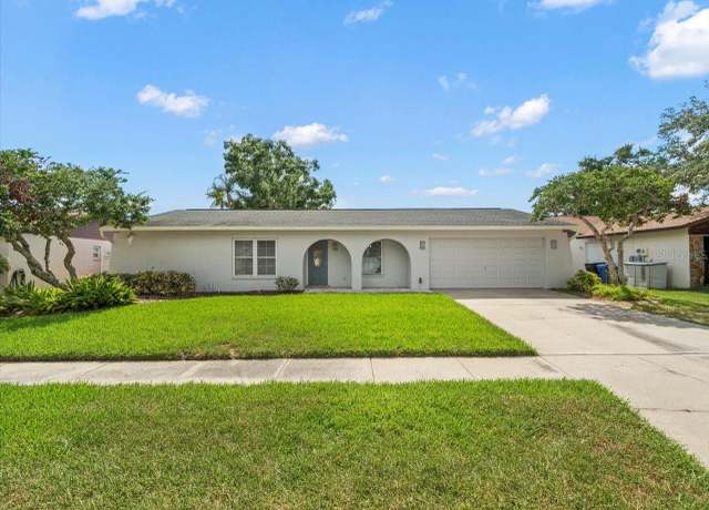Property at 4016 Windtree Dr, Tampa, FL 33624, 4 beds, 2 baths
