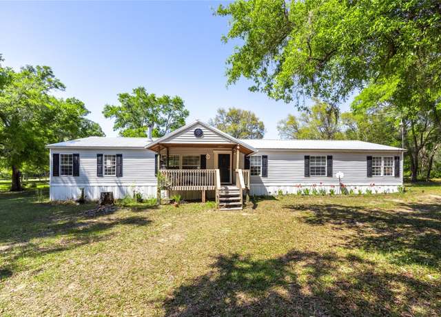 Property at 10291 NE 131st Pl, Archer, FL 32618, 4 beds, 2 baths