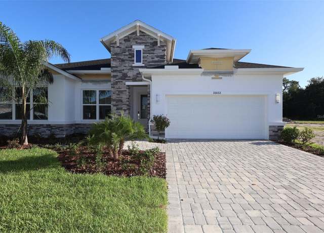 Property at 31453 Hayman Loop, Wesley Chapel, FL 33545, 4 beds, 3 baths