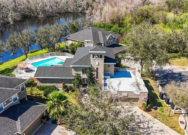 Property at 7425 Terrace River Dr, Temple Terrace, FL 33637, 4 beds, 3.5 baths