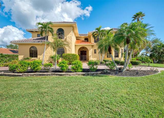Property at 3060 Rivershore Ln, Port Charlotte, FL 33953, 4 beds, 4.5 baths