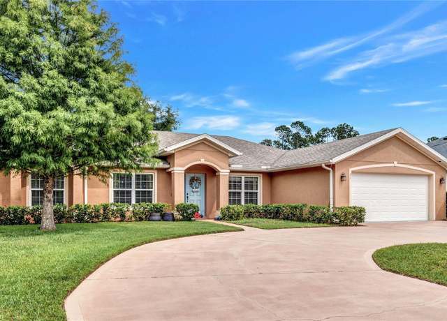 Property at 71 Eric Dr, Palm Coast, FL 32164, 4 beds, 2 baths