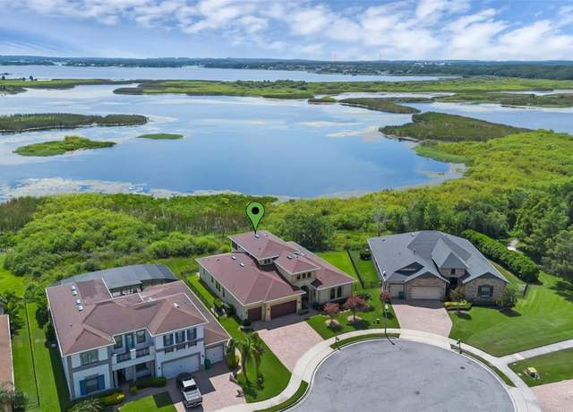 Property at 15344 Johns Lake Pointe Blvd, Winter Garden, FL 34787, 4 beds, 4.5 baths