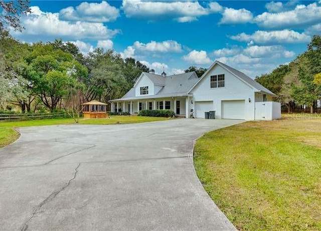 Property at 6936 Handcart Rd, Wesley Chapel, FL 33545, 7 beds, 4 baths