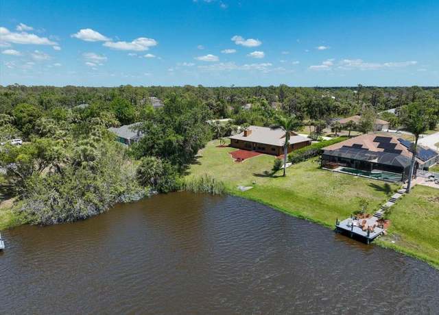 Property at 6305 Shalimar St, Port Charlotte, FL 33981, 3 beds, 3 baths