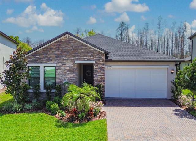 Property at 21577 Violet Periwinkle Dr, Land O Lakes, FL 34637, 4 beds, 3 baths