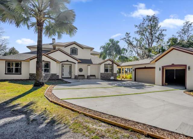 Property at 168 Bethel Oaks Ln, Deltona, FL 32738, 4 beds, 3.5 baths