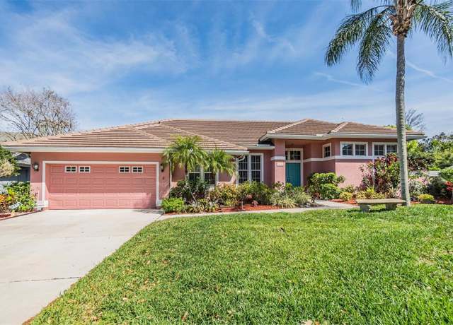 Property at 3136 Sandhill Dr, Holiday, FL 34691, 4 beds, 3 baths