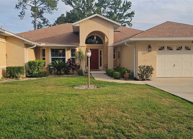 Property at 62 Barkley Ln, Palm Coast, FL 32137, 3 beds, 2.5 baths