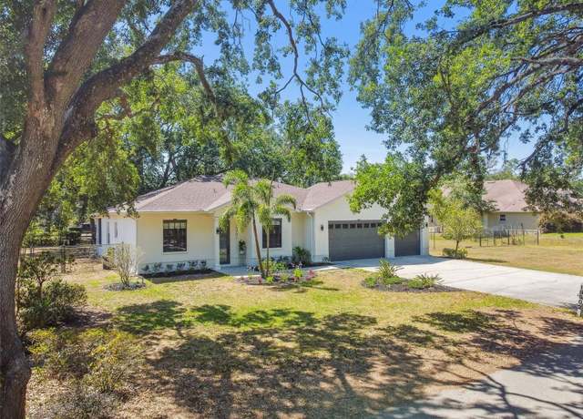 Property at 18902 Spring Hollow Dr, Lutz, FL 33559, 3 beds, 2 baths