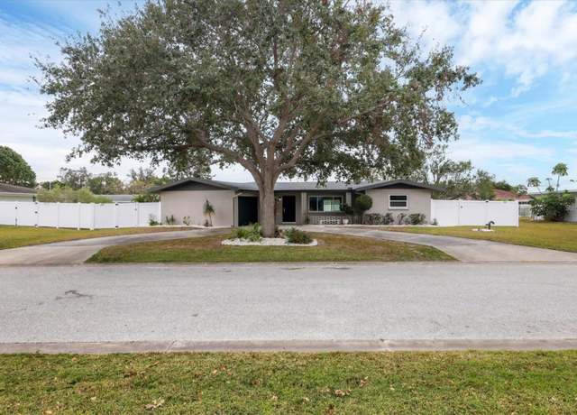 Property at 2430 Sunnyside Ln, Sarasota, FL 34239, 3 beds, 2 baths